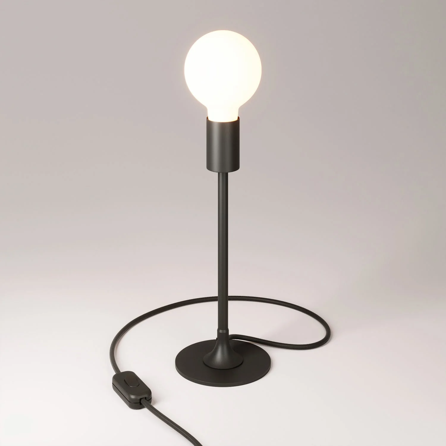 Lampe de table MAG-Y avec base métallique ronde et fiche UK - Noir
